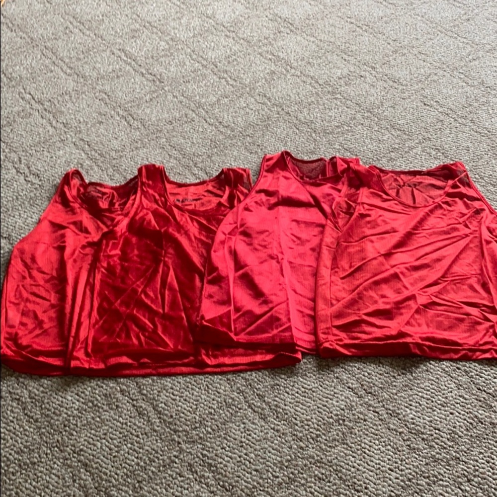 - Set of FOUR RED PINNIES for sports. YOUTH LARGE